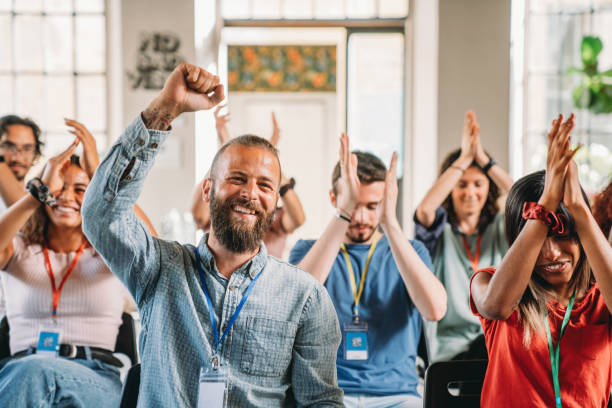 istock People are applauding during a conference 1423632993