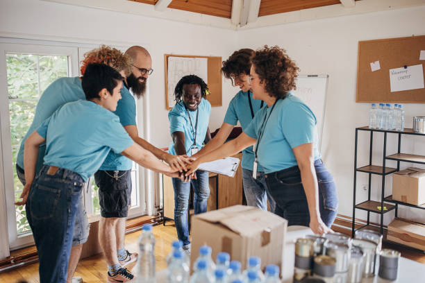 istock Charity volunteers working together 1423635372