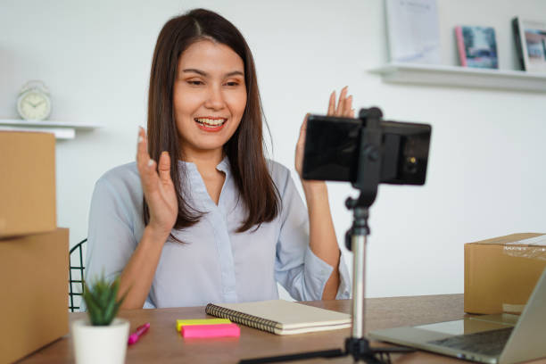 istock Successful businesswoman vlogger coach talking to camera for video live and training teaching people for how to succeed online marketing, Small business owner, online market delivery concept 1423637227