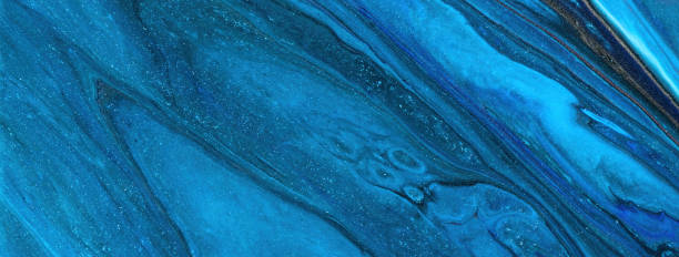 Abstract fluid art background navy blue colors. Liquid marble. Acrylic painting with sapphire gradient Abstract fluid art background navy blue colors. Liquid marble. Acrylic painting with sapphire gradient and splash. Watercolor backdrop with wavy pattern. Stone ultramarine marbled section. saphire photos stock pictures, royalty-free photos & images