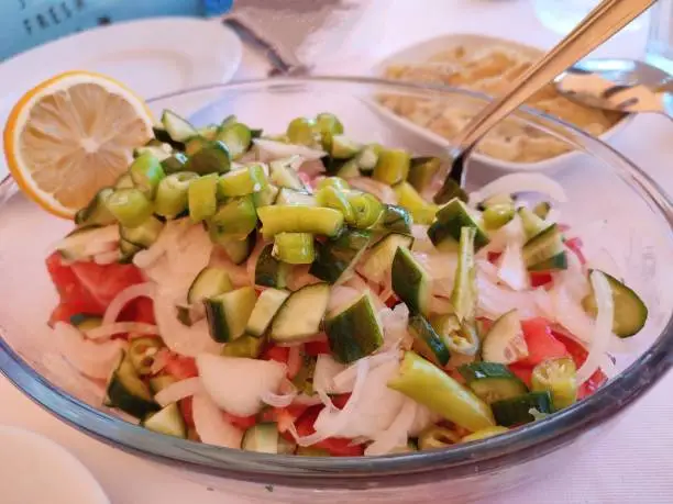 Traditional turkish shephard salad with tomato garlic and onion at Istanbul turkey