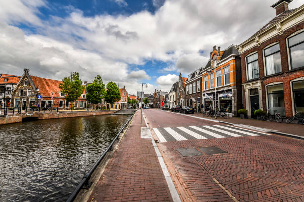istock Vendors On River Canal In Sneek, The Netherlands 1423639897
