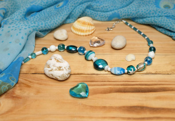 istock Composition with a necklace of Murano beads in blue tones 1423640563
