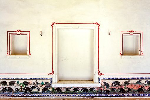 White interior decorated with painted black elephants inside of Kumbhalgarh fortress, Rajasthan, India, Asia