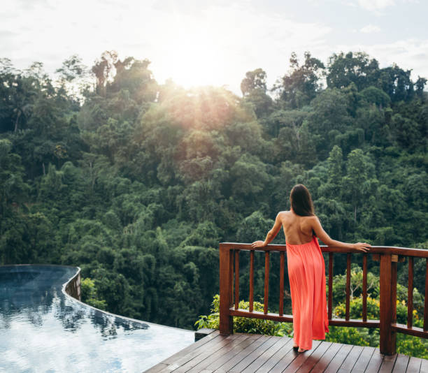 istock Relaxed woman looking at beautiful view 1423642299