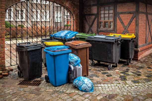 istock Garbage cans in different colors symbolizing recycling on the street 1423642614