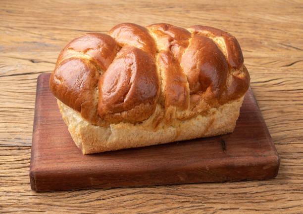 istock Loaf of brioche bread over wooden table 1423644430