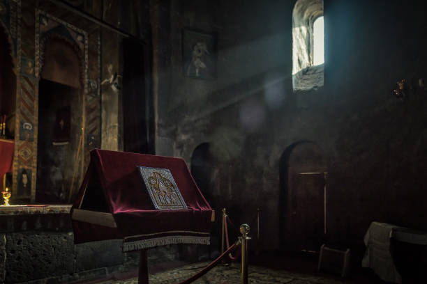 istock Light from the windows on the altar of the old temple 1423644564