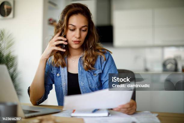 Woman Complaining On The Phone Stock Photo - Download Image Now - Using Phone, Financial Bill, Women