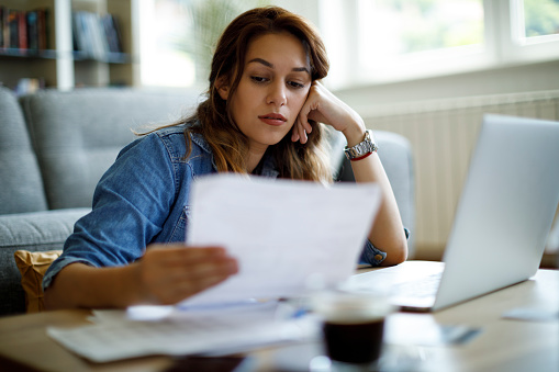 Worried woman about home finances