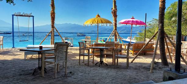 Gili Trawangan sea view scenic view of Gili Trawangan sea seen from the restaurant with a blend of sea, clear sky and hills gili trawangan stock pictures, royalty-free photos & images