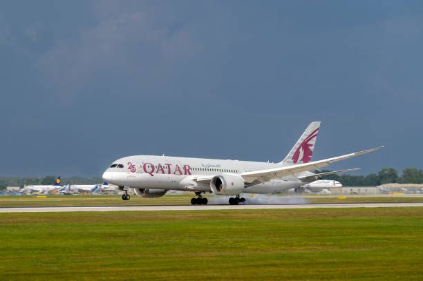 Qatar Airways Boeing 787-8 Dreamliner with the aircraft registration A7-BDA is landing on the southern runway 26L of the Munich Airport MUC EDDM Munich, Germany - August 26. 2022 : Qatar Airways Boeing 787-8 Dreamliner with the aircraft registration A7-BDA is landing on the southern runway 26L of the Munich Airport MUC EDDM munich airport stock pictures, royalty-free photos & images