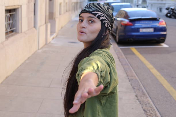 istock Woman offering hand to someone 1423659201