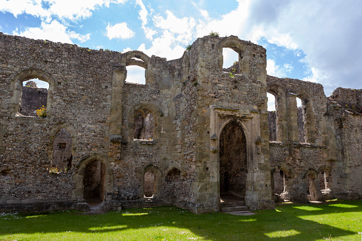 The remains of the royal apartments built by Richard II in the 1390s, showing the great hall range: Portchester Castle, Portchester, Hampshire, UK.  The castle is now a Grade 1 listed building and Scheduled Ancient Monument.