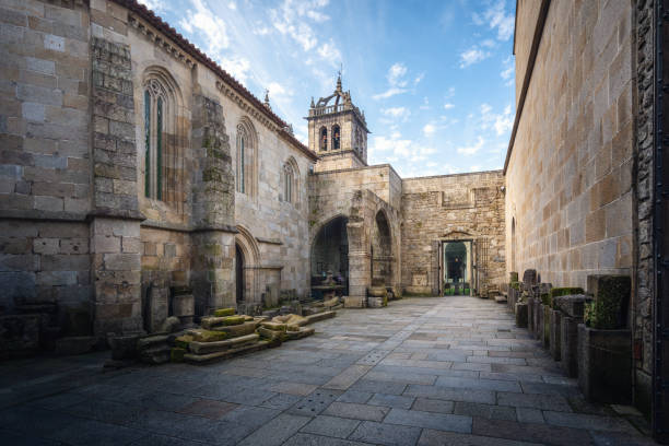 Former Santo Amaro Cloister at Sé de Braga Complex with Cathedral Tower - Braga, Portugal Former Santo Amaro Cloister at Sé de Braga Complex with Cathedral Tower - Braga, Portugal braga district stock pictures, royalty-free photos & images