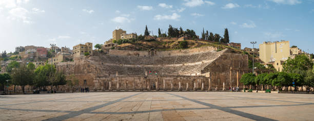 ancient Roman theater panorama in Amman downtown on a sunny day in Jordan stock photo