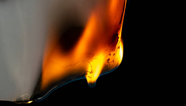 istock burning plastic close up, plastic is burning, melts and drips 1423670322