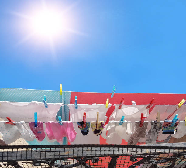 istock pegs laundry clothes drying by the sun  energy saving 1423677276