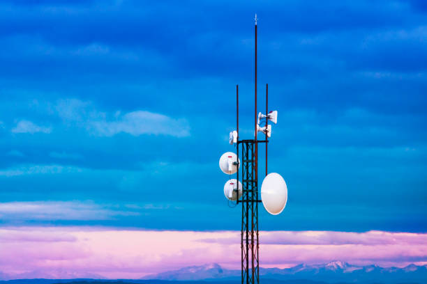Telecommunications antenna tower,  evening moody sky. Galicia, Spain. Copy space on theleft.