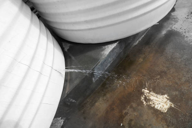 istock Water leaking from water storage tank 1423684231