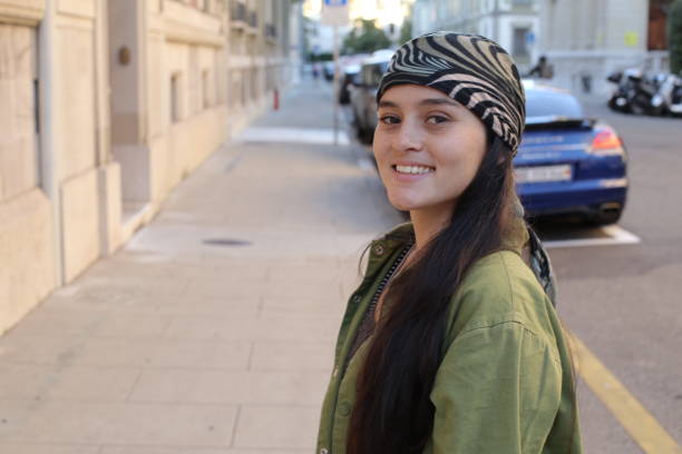 istock Young urban woman looking at camera 1423693276