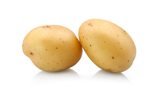 Two raw potatoes isolated on white background