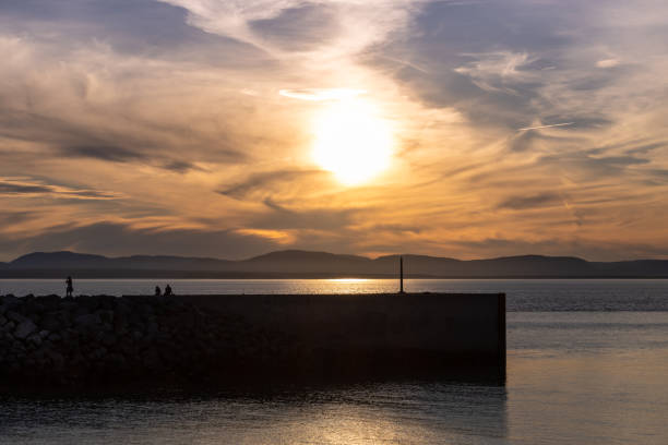 istock Beautiful sunset on Riviere-du-Loup pier. Riviere-du-Loup, Quebec, Canada. 1423710056