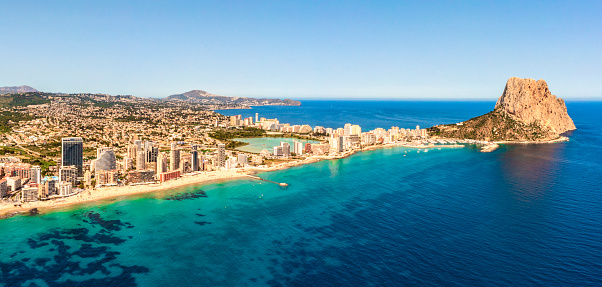 Aerial view of Calp city with beach and Ifach rock in Costa Blanca Spain