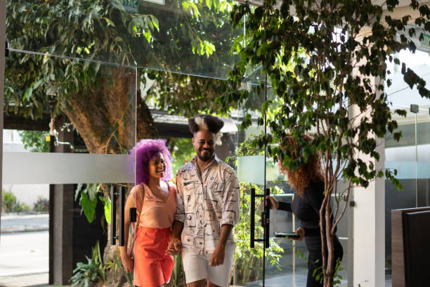 istock Young couple entering the restaurant 1423713849