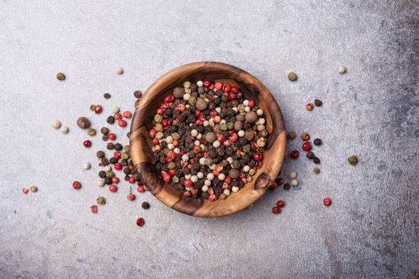 istock Mix peppercorns in wooden bowl 1423719932