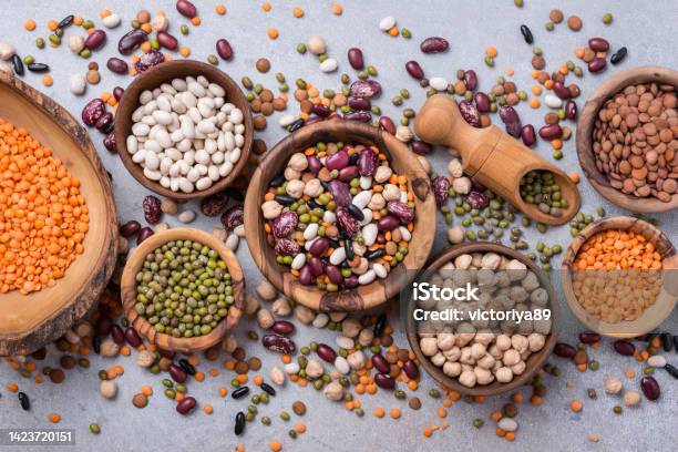 Different Beans Lentils Mung Chickpeas In Wooden Bowls Stock Photo - Download Image Now