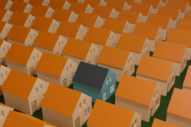 A blue house standing out of the rest of houses in beige color