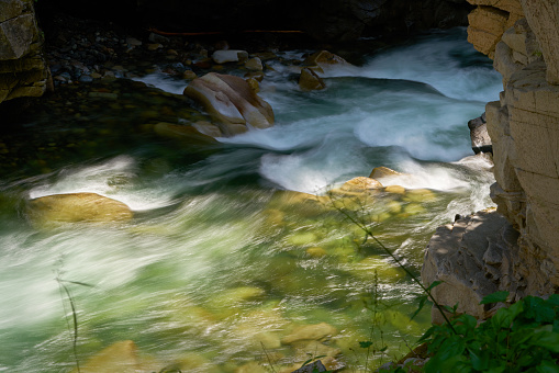A cold, clear mountain creek in the Pacific Northwest. Long exposure motion blur.