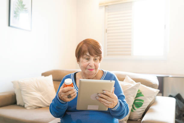 istock Lady checking medication usage by telemedicine with digital tablet 1423737427