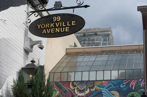 Toronto, ON, Canada - August 4, 2022: Yorkville Avenue Sign at 99 Yorkville, historic neighbourhood