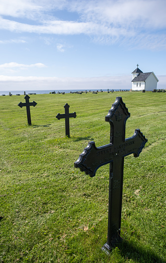 Varhaug, Norway - June 3, 2022:  Varhaug Gamle Gravlund  is a cemetery located in the sea gap on the farm Varhaug in Ha municipality. The church square is from the Middle Ages.  Selective focus.