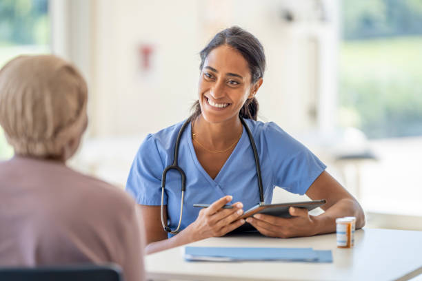 istock Nurse Meeting with a Cancer Patient 1423758515