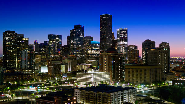 istock Aerial View of Downtown Skyline in Houston,  Texas at Nightfall 1423764773