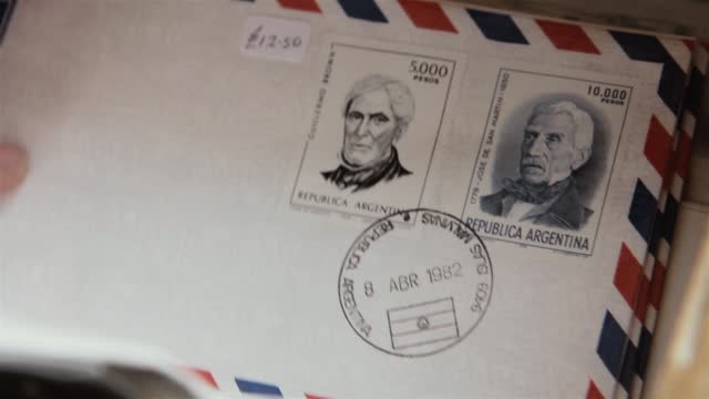 Old Letters and Postal Stamps showing the Argentine National Hero, San Martin, at the Jetty Visitor Centre, Stanley, Falkland Islands (Islas Malvinas).