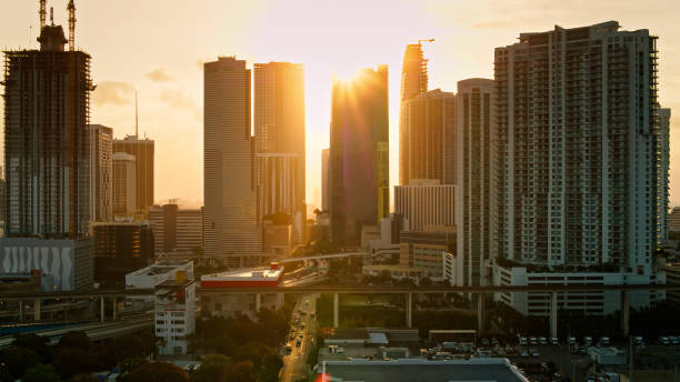 istock Sun Rising Behind Mimi Condo Towers - Drone Shot 1423765080