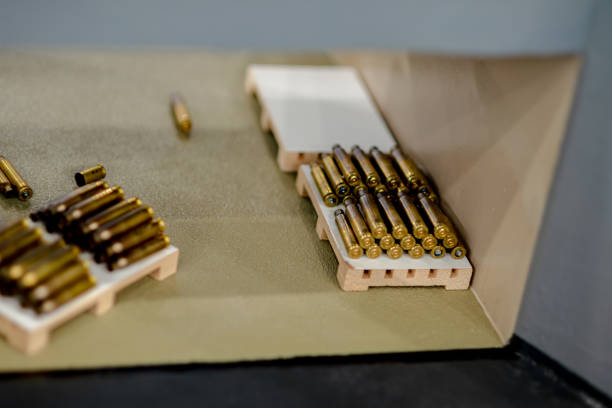 istock Cartridge cases lie on wooden pallets 1423766376