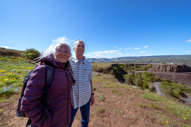 istock Beautiful mixed race retiree couple adventuring together 1423766540
