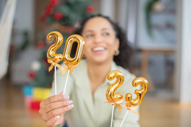 istock Happy woman celebrating Christmas 1423766953