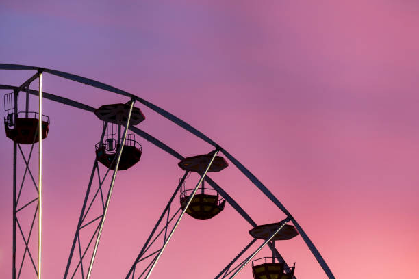 istock Ferris wheel at the sunset, closeup 1423767217