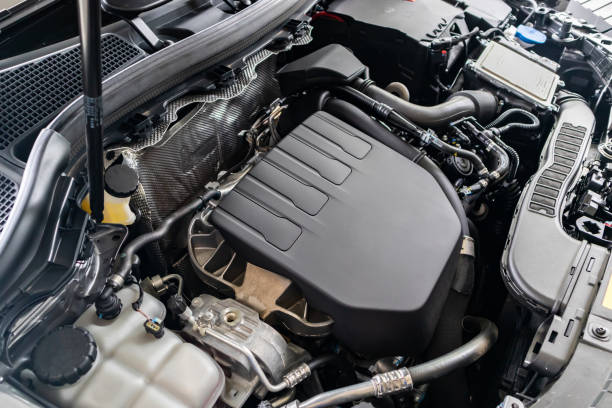 istock modern car engine under hood close up detail 1423767348