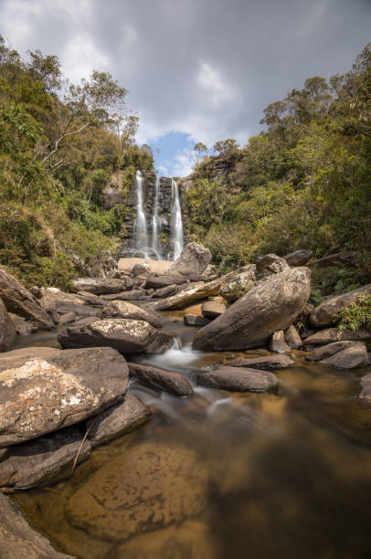 istock Beautiful waterfall in rain forest landscape 1423768858