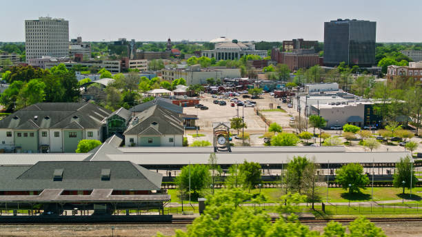 Aerial View of Train Station in Downtown Lafayette, Louisiana Aerial shot of Lafayette, Louisiana on a clear and sunny spring day. 

Authorization was obtained from the FAA for this operation in restricted airspace. lafayette louisiana photos stock pictures, royalty-free photos & images