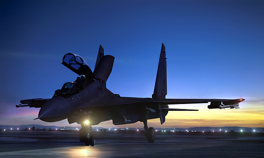 Fighter jet in the deep blue night sky. 3D render