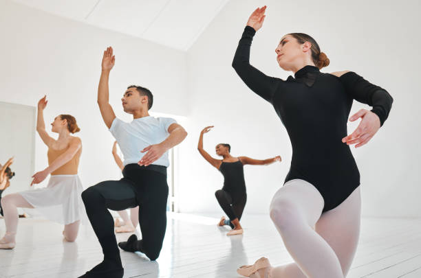 istock Shot of a group of young ballet dancers practicing their routine in a dance studio 1423797811