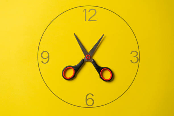 istock creative layout of hour clock made of scissors on pastel background 1423798604